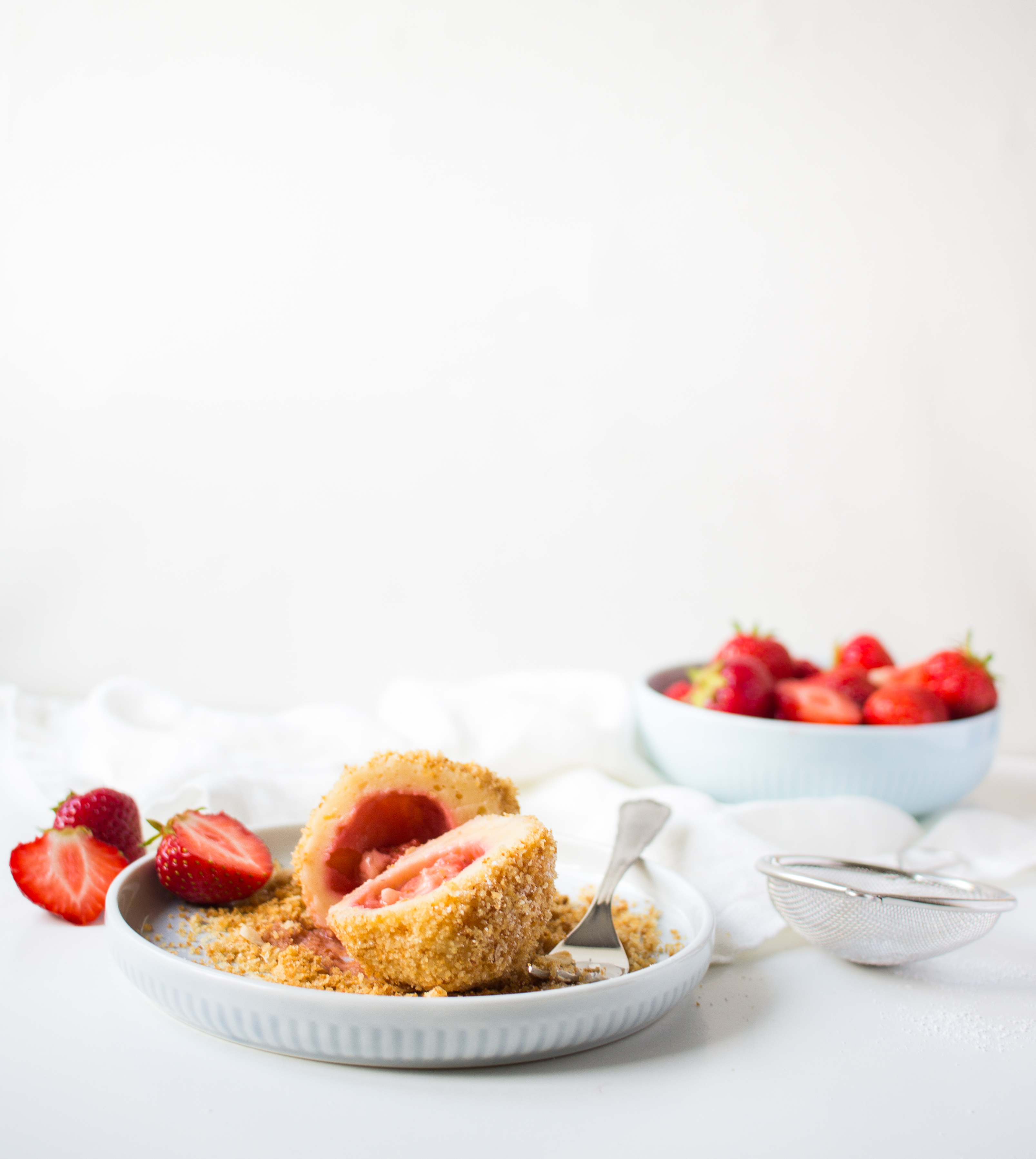 Bild zu Erdbeerknödel mit Topfenteig