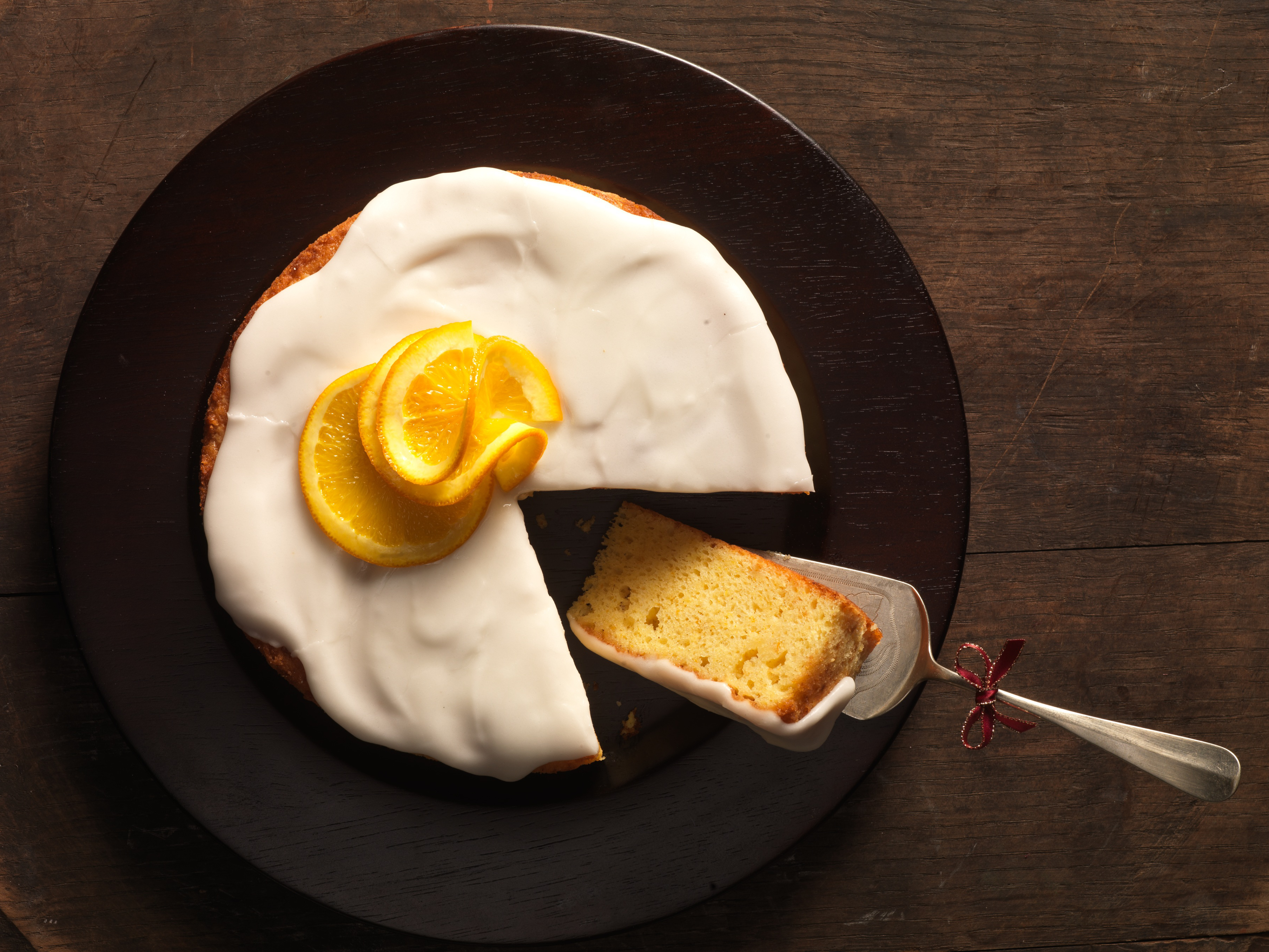 Bild zu Getränkte Orangentorte